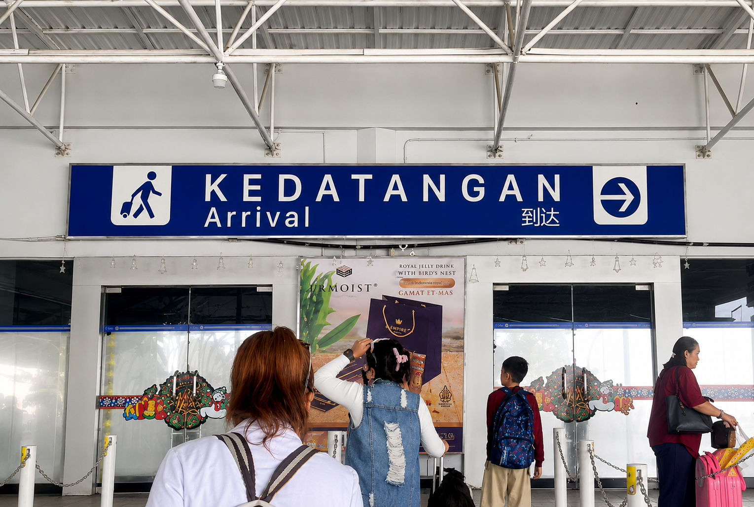 Lightbox next to Arrival Immigration Hall Entrance